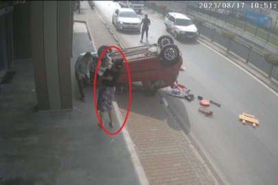 Aracıyla takla atan anne kızına koştu