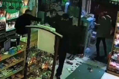 Bursa'da para üstü kavgası kamerada: Market savaş alanına döndü